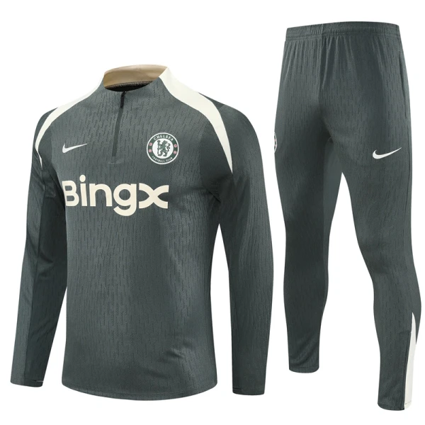 Komplet Trenirke za Treniranje Chelsea Četvrt-Zip 2025/26 Sivo Komplet Trenirke za Treniranje Chelsea Četvrt-Zip 2025/26 Sivo