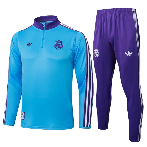 Komplet Trenirke za Treniranje Real Madrid Četvrt-Zip 2025/26 Plava Komplet Trenirke za Treniranje Real Madrid Četvrt-Zip 2025/26 Plava